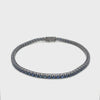 BRACELET TENNIS EN OR BLANC NOIRCI AVEC SAPHIRS BLEUS